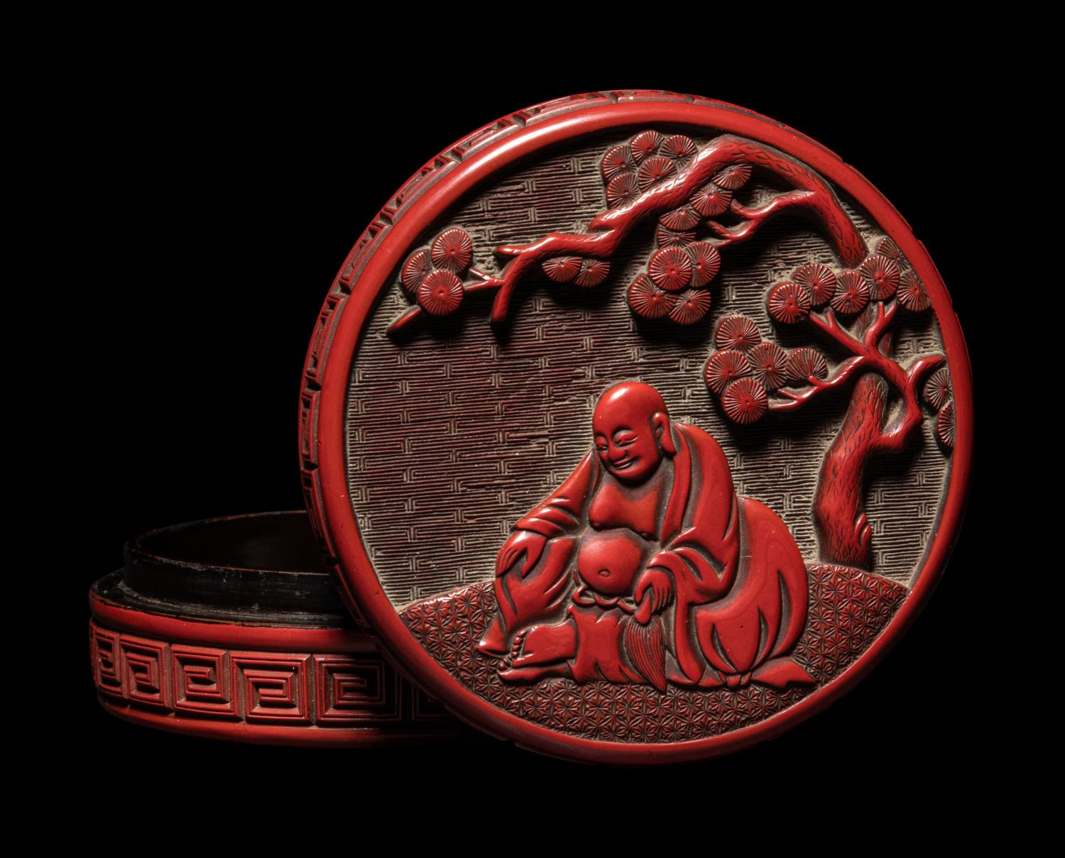 A Carved Cinnabar Lacquer 'Luohan' Circular Covered Box