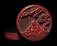A Carved Cinnabar Lacquer 'Luohan' Circular Covered Box