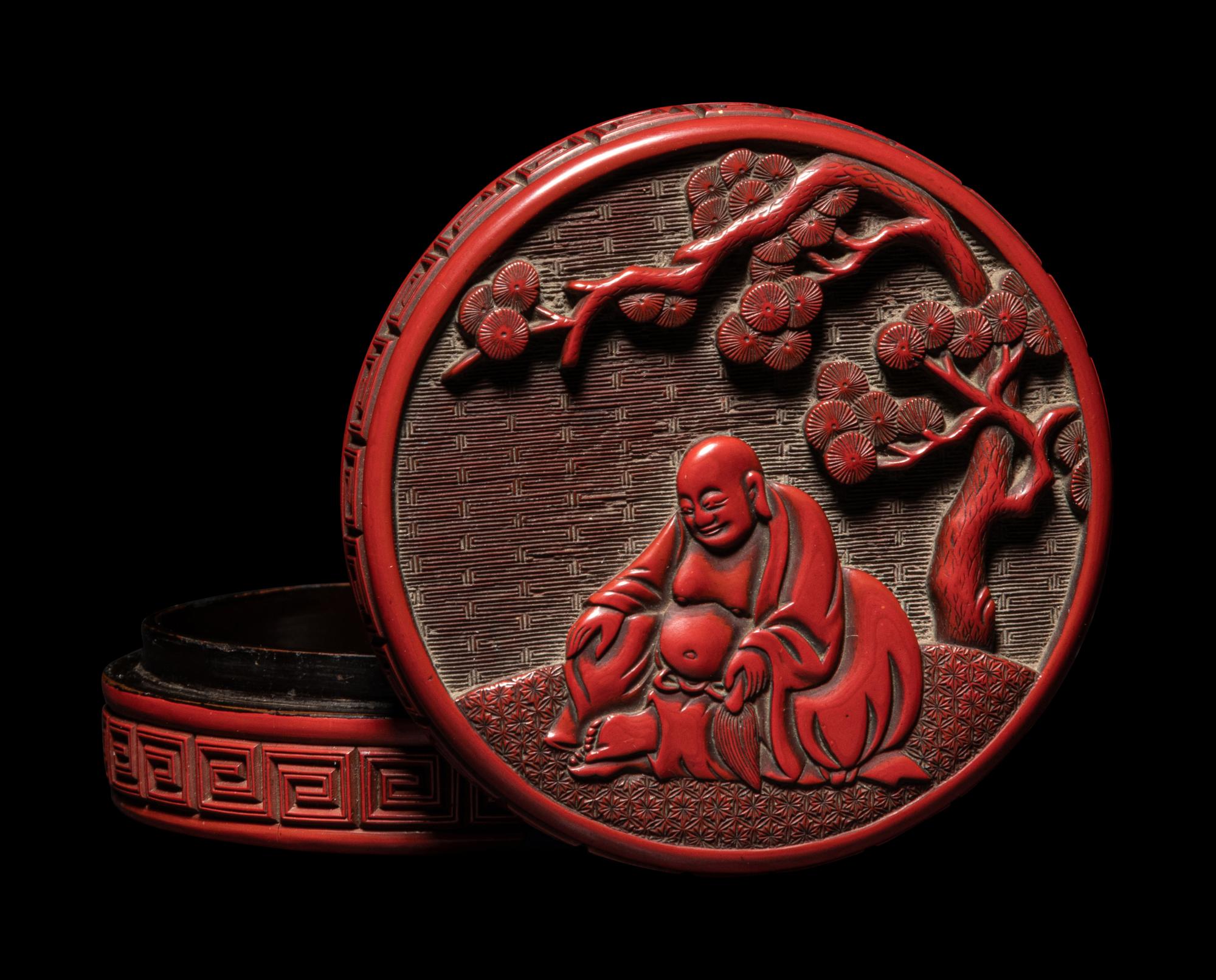 A Carved Cinnabar Lacquer 'Luohan' Circular Covered Box