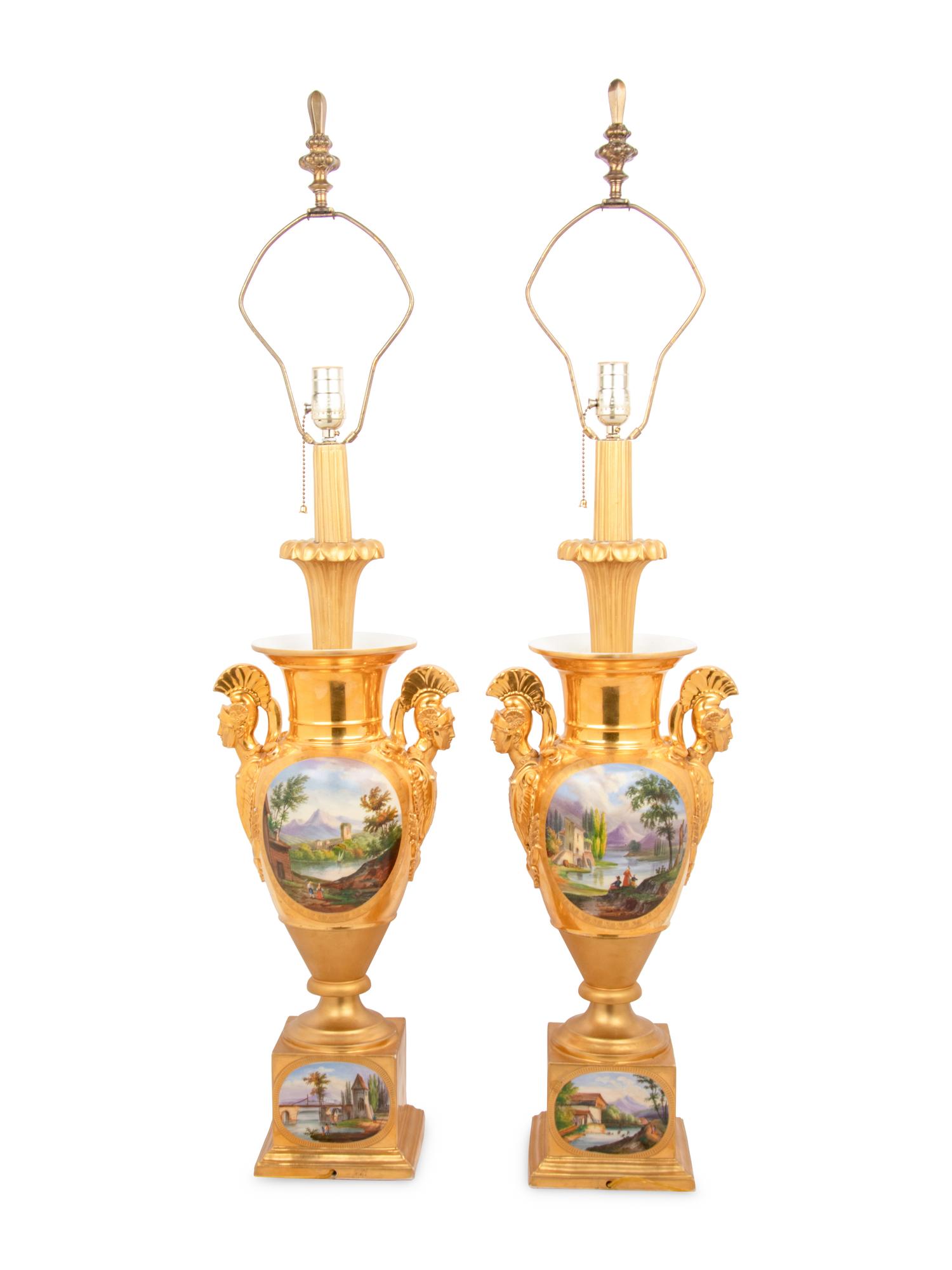 A Pair of Empire Style Painted and Parcel Gilt Porcelain Urns