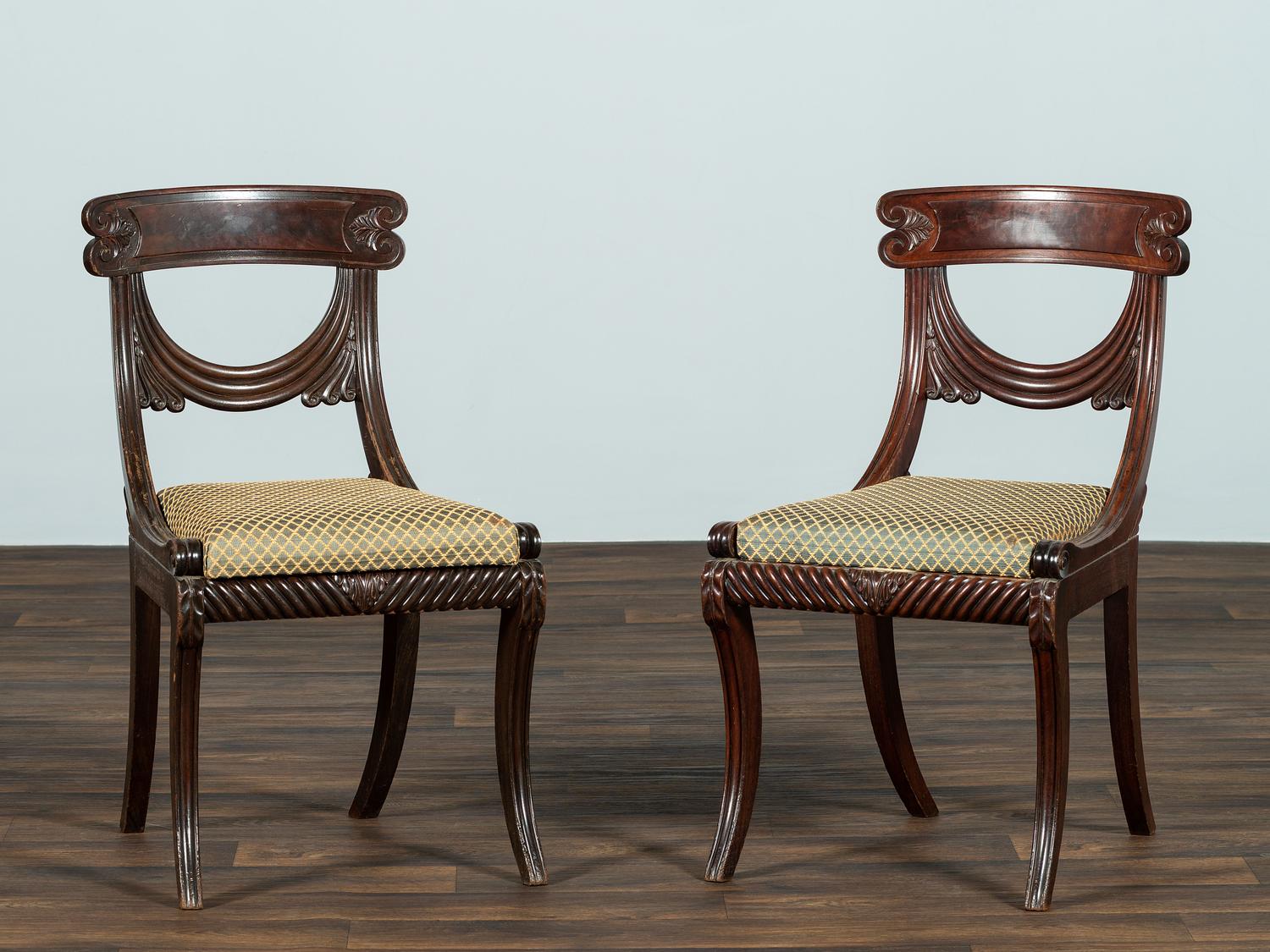 A Pair of Classical Drapery Carved Mahogany Side Chairs