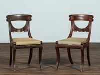 A Pair of Classical Drapery Carved Mahogany Side Chairs