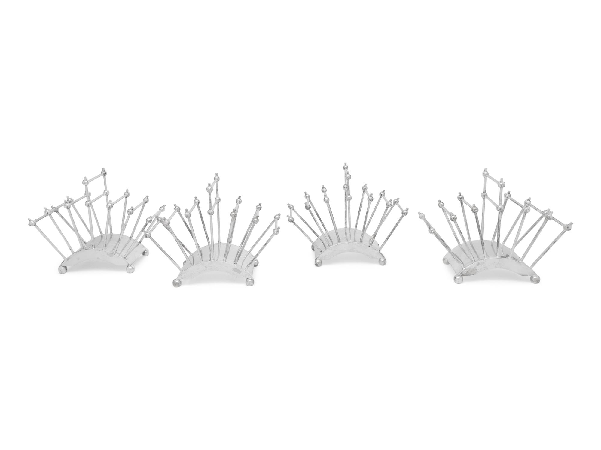 A Group of Silver-Plate Table Articles in the Manner of Christopher Dresser