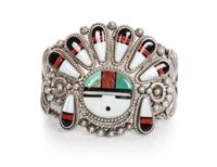 A Zuni Mosaic Sun Face Bracelet Length 5 1/4 x opening 7/8 x width 2 1/4 inches.