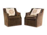 A Pair of Upholstered Swivel Club Chairs