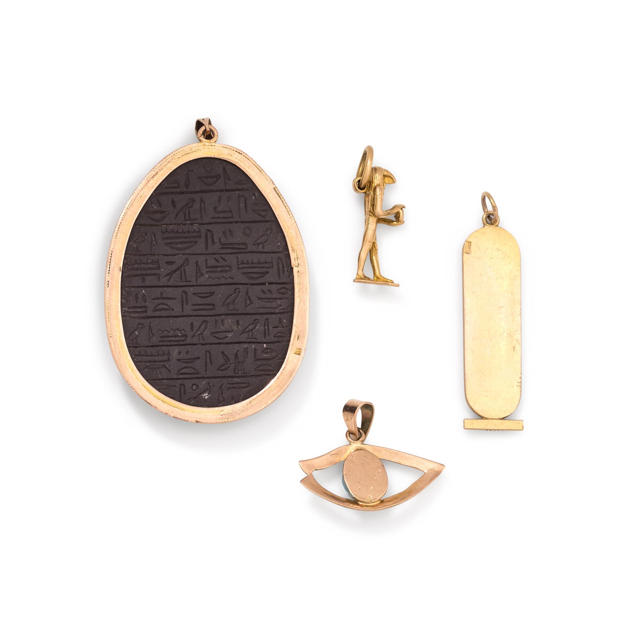 COLLECTION OF YELLOW GOLD EGYPTIAN MOTIF PENDANTS