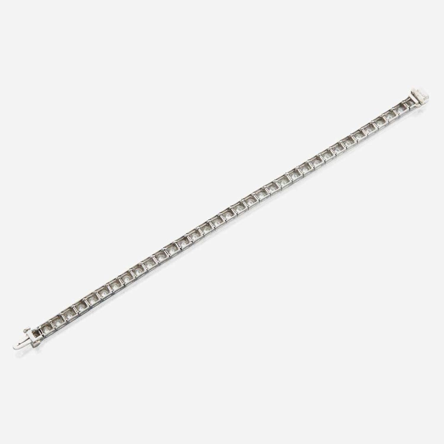 A diamond and platinum line bracelet