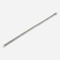 A diamond and platinum line bracelet