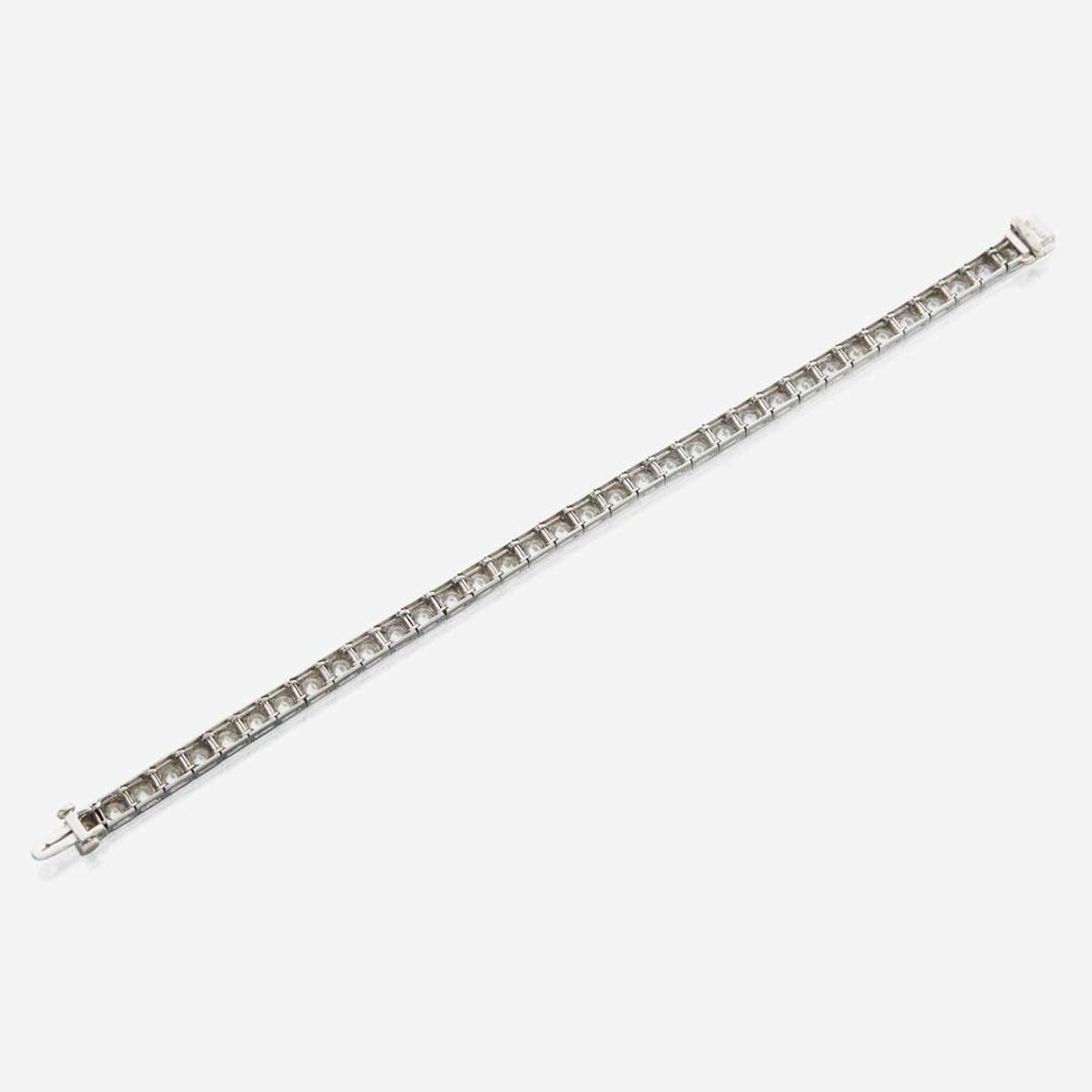A diamond and platinum line bracelet