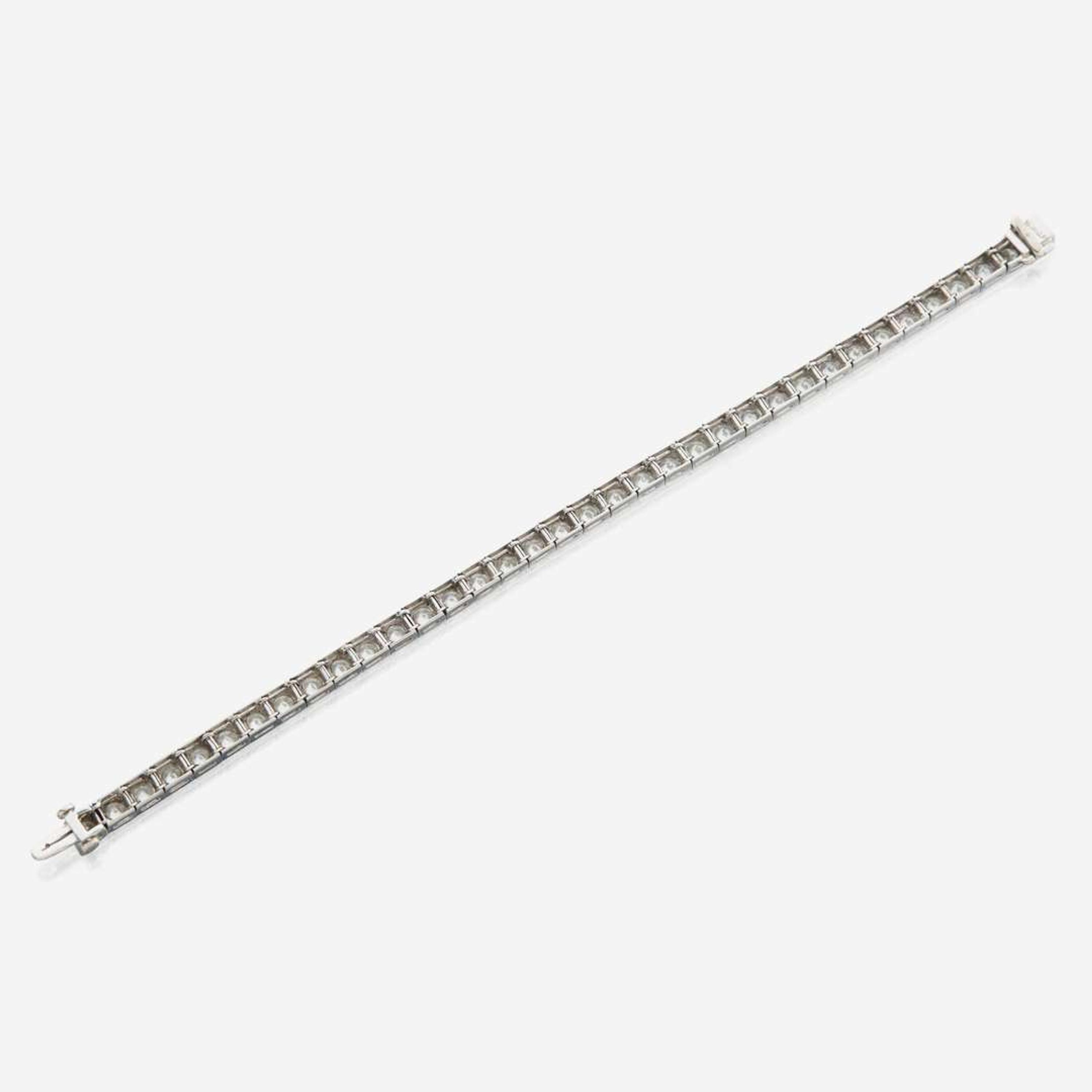 A diamond and platinum line bracelet