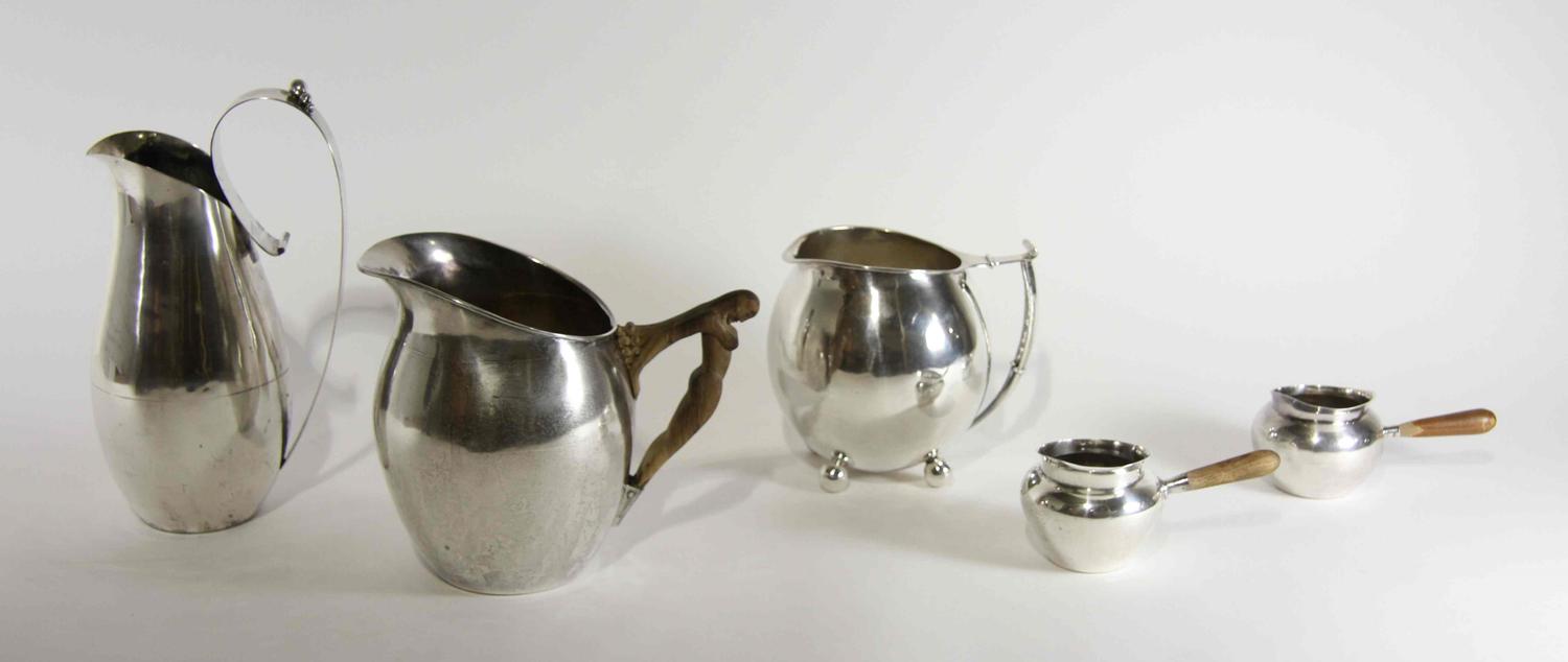 Five Mexican Silver Table Articles, Royal Haeger by Royal Hickman, 20th Century, comprising three pitchers and two brandy warmers.