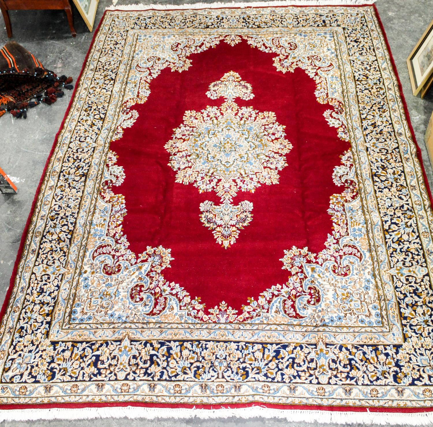 A Kirman Wool Rug 10 feet 5 inches x 7 feet 3 inches. — CIRCA 1970