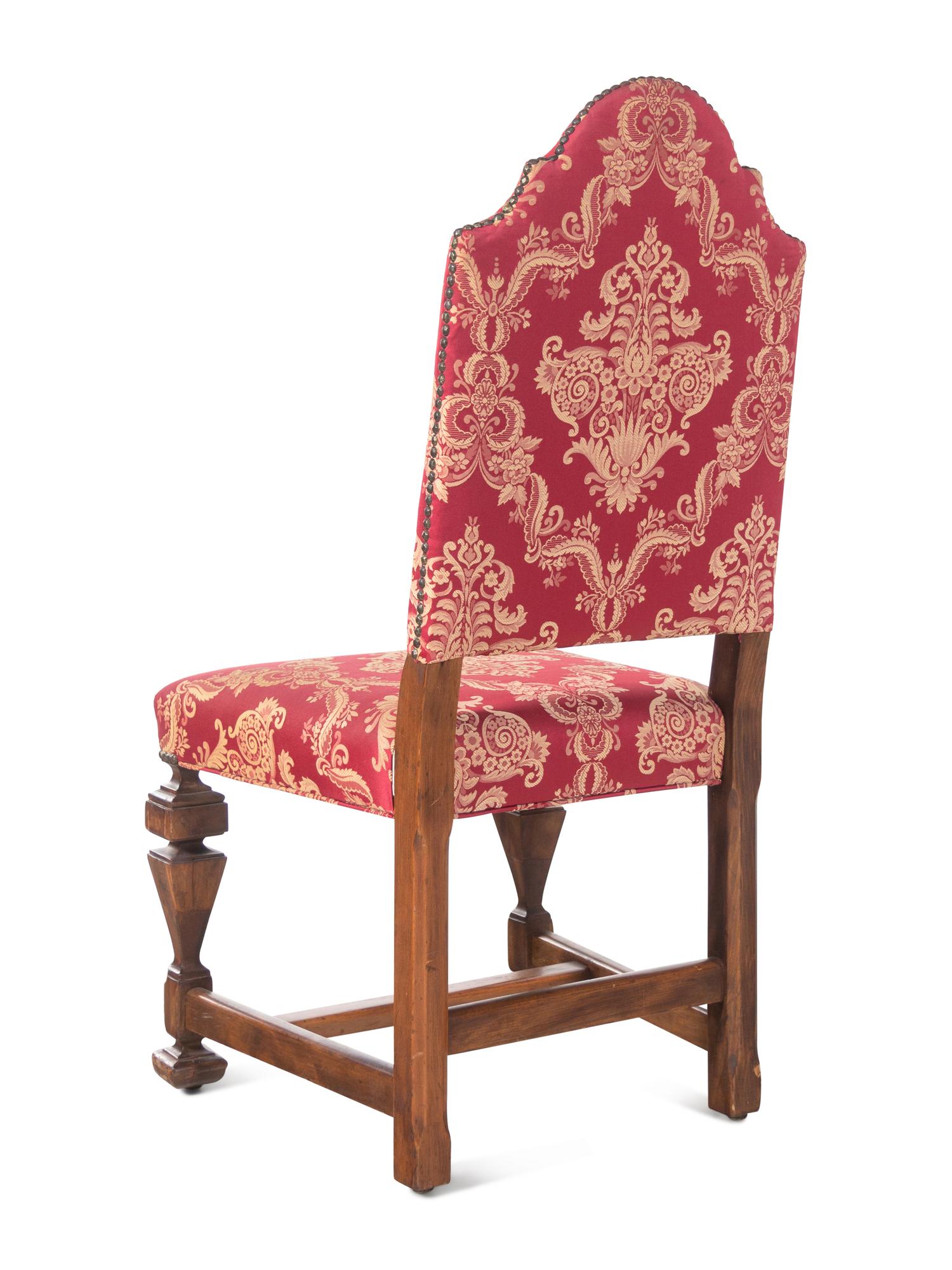 A Set of Eight Renaissance Revival Dining Chairs