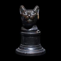 An Egyptian Bronze Head of a Cat