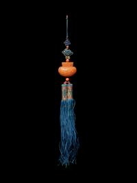A Beewax Purse-Form Pendant