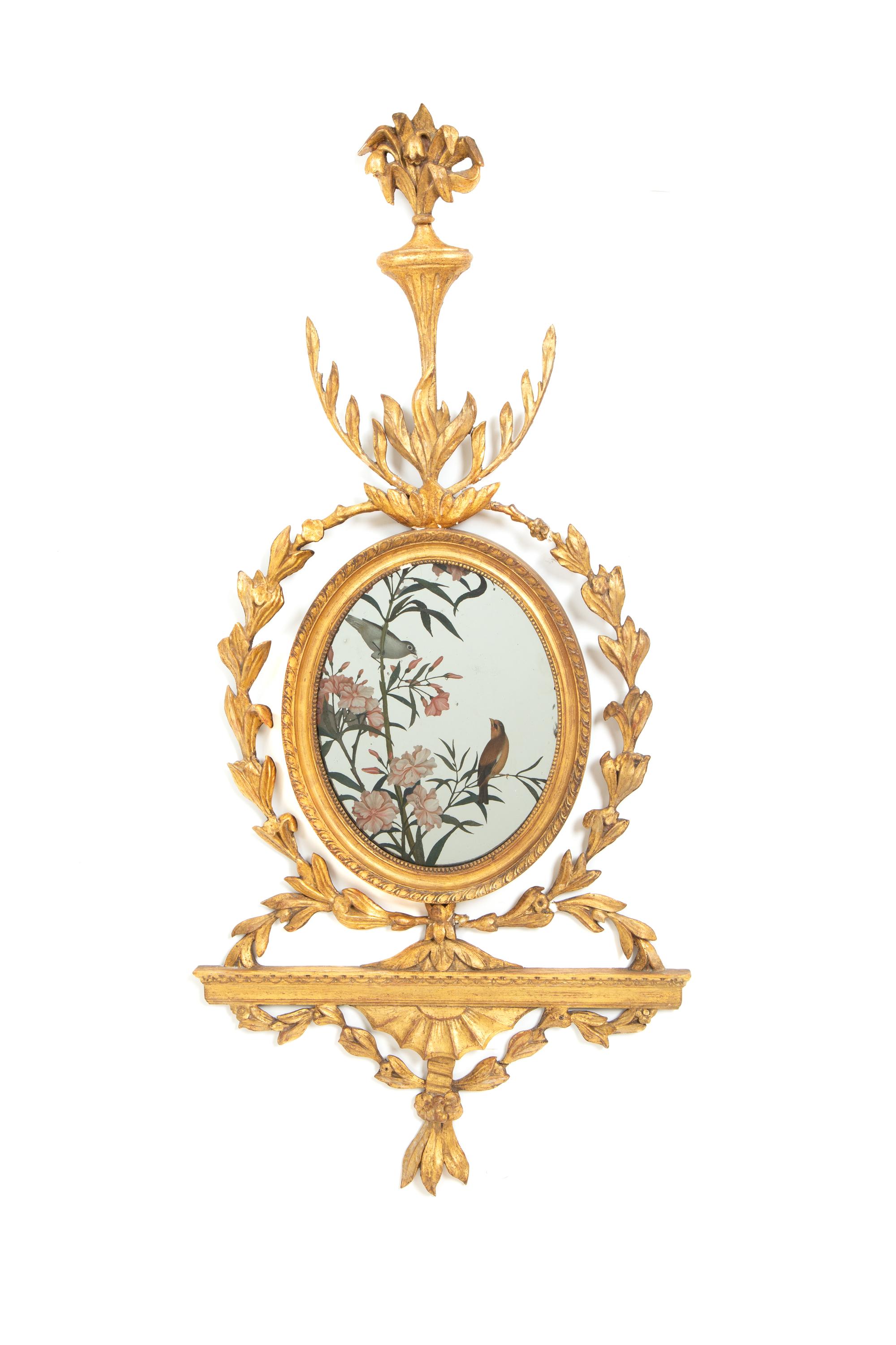 A Pair of George III Giltwood and Reverse-Painted Mirror Wall Appliques