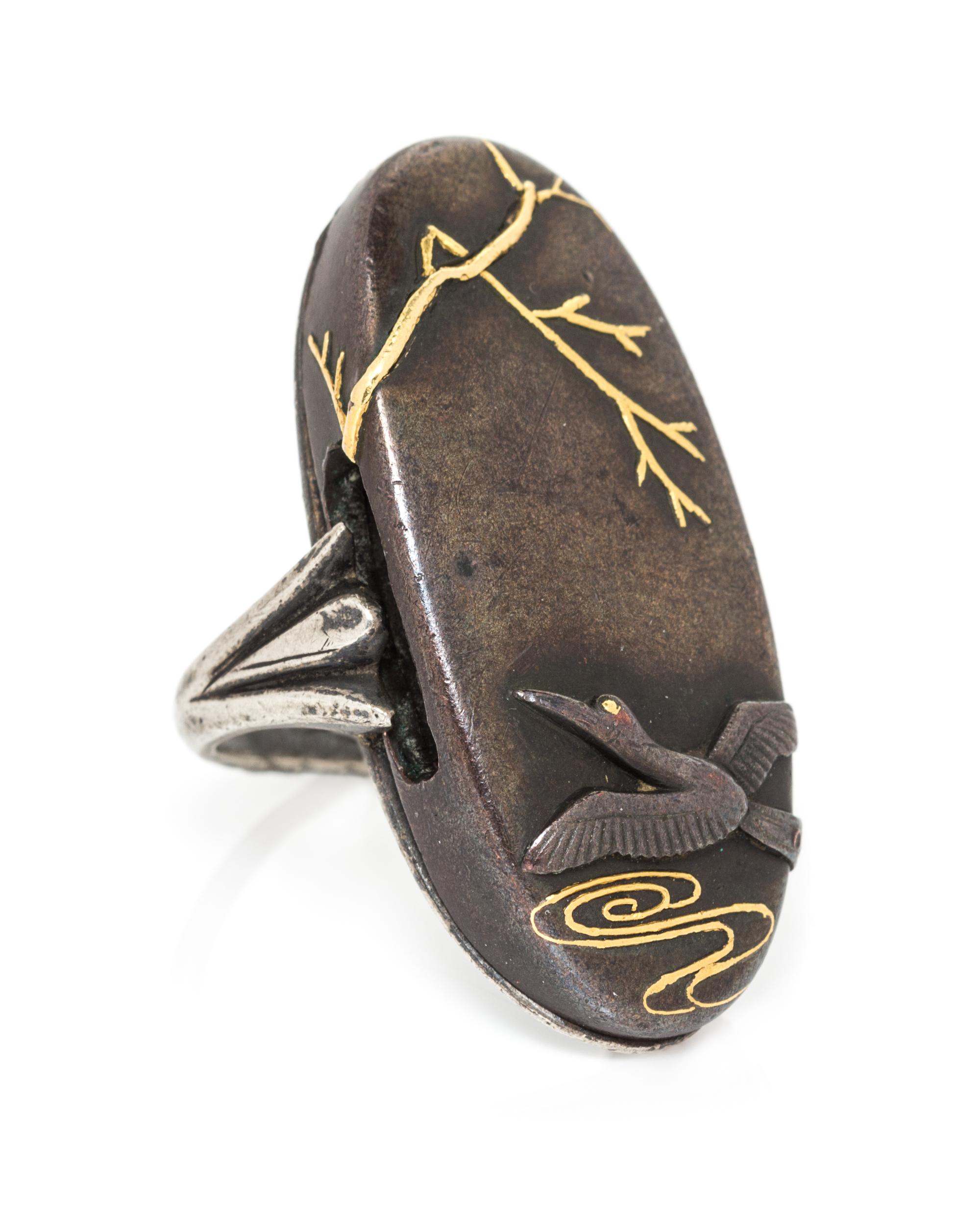 A Silver and Shakudo Ring, 8.80 dwts.