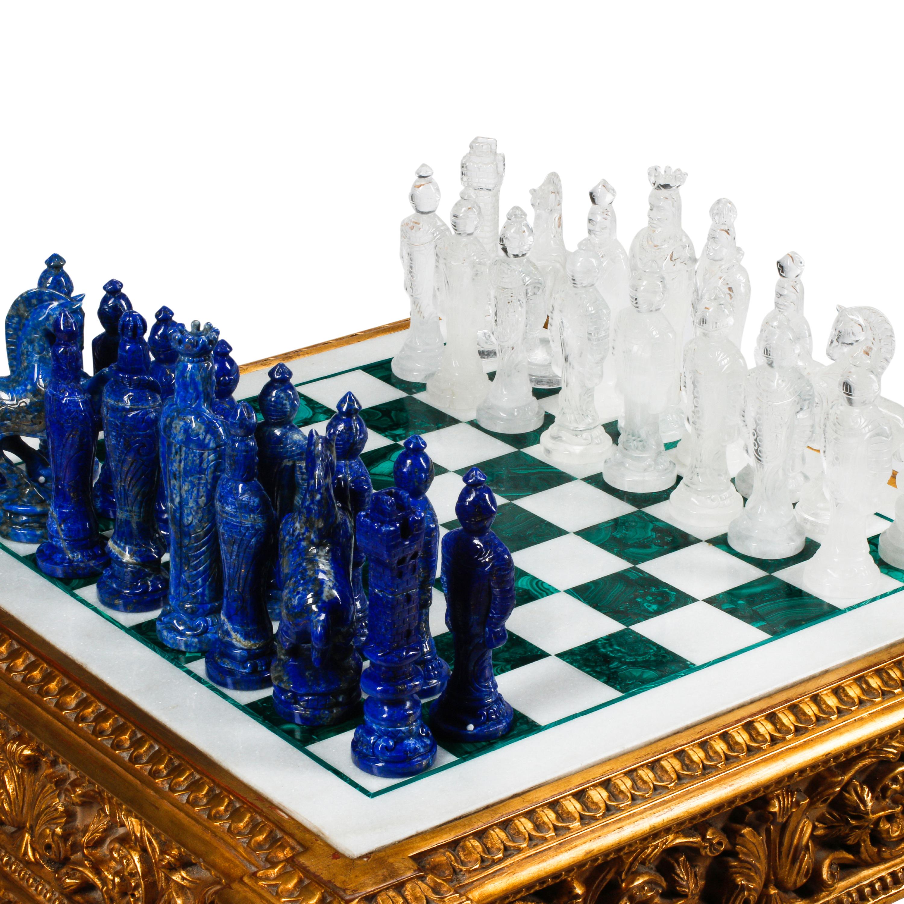 A Louis XVI Style Giltwood, Marble and Malachite Game Table with a Carved Rock Crystal and Lapis Lazuli Chess Set
