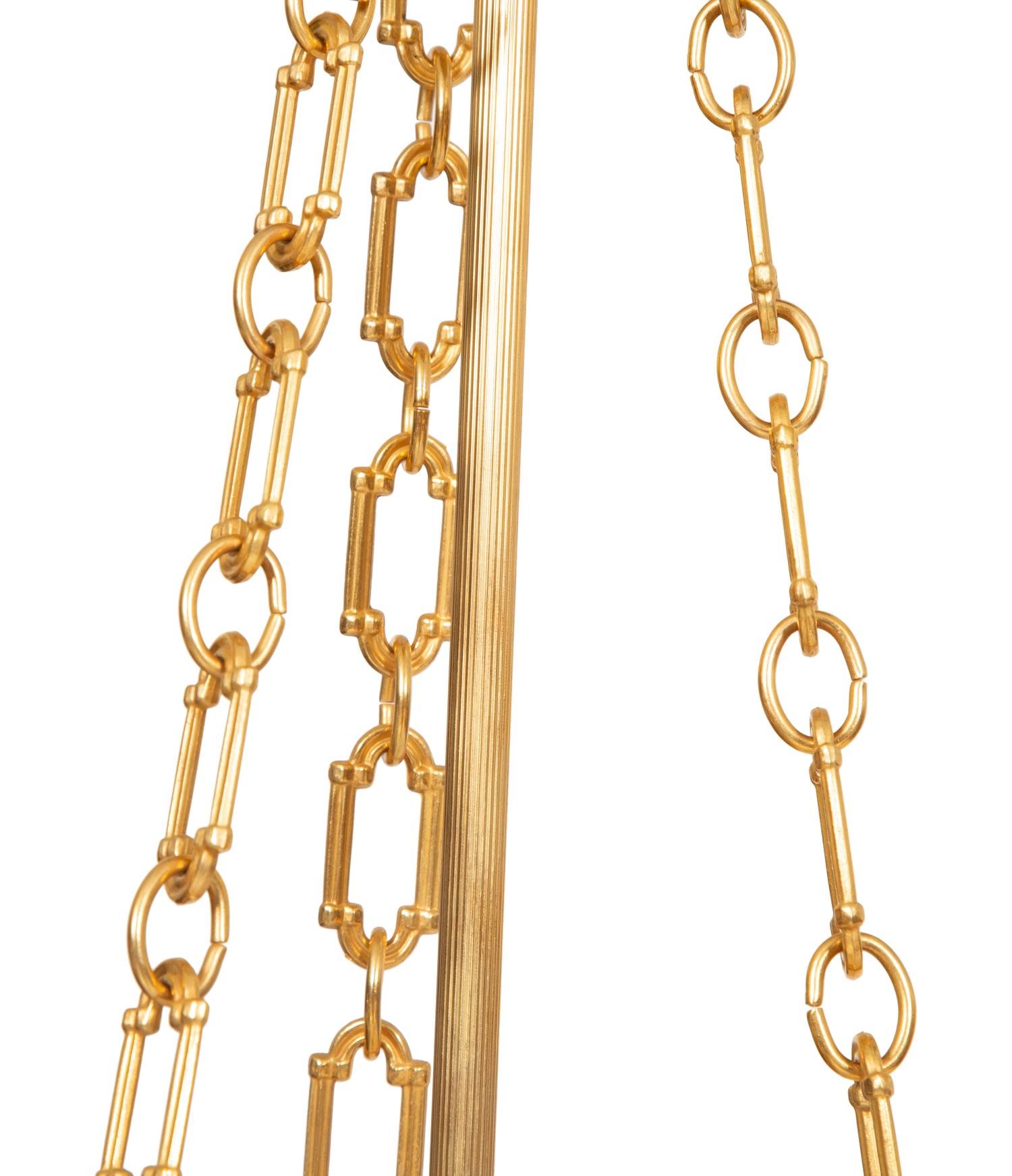 A Pair of French Gilt Metal and Glass Lanterns