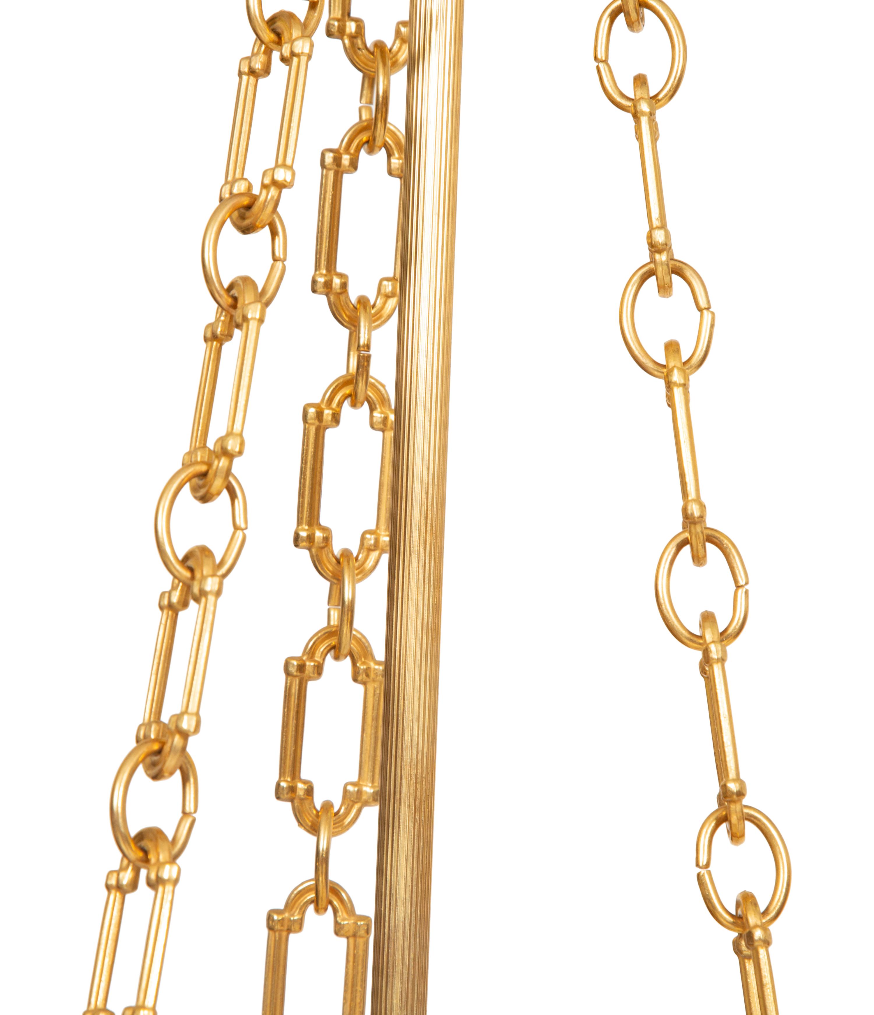 A Pair of French Gilt Metal and Glass Lanterns