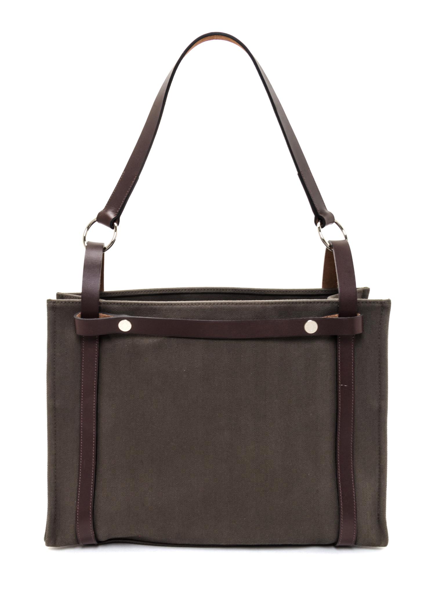 An Hermes Vert de Gris Canvas and Ebene Vache Cabalicol Tote, 15.5" x 11.5" x 6.5".