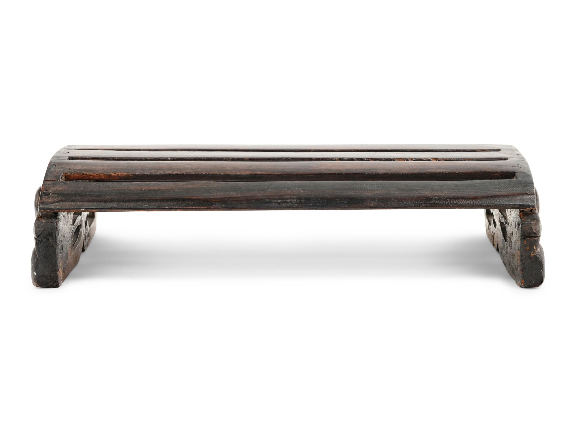 A Chinese Hardwood 'Demi-Lune' Foot Rest