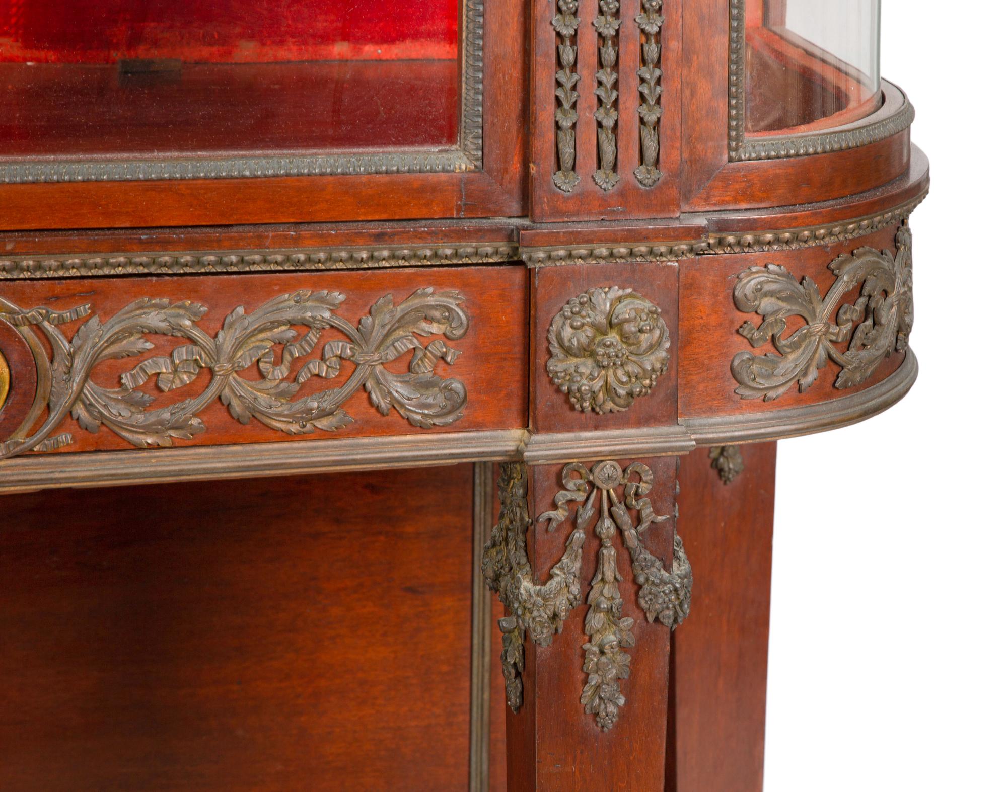 A Fine French Carved Mahogany Gilt Bronze Mounted and Glazed Curio Cabinet on Stand — CIRCA 1890