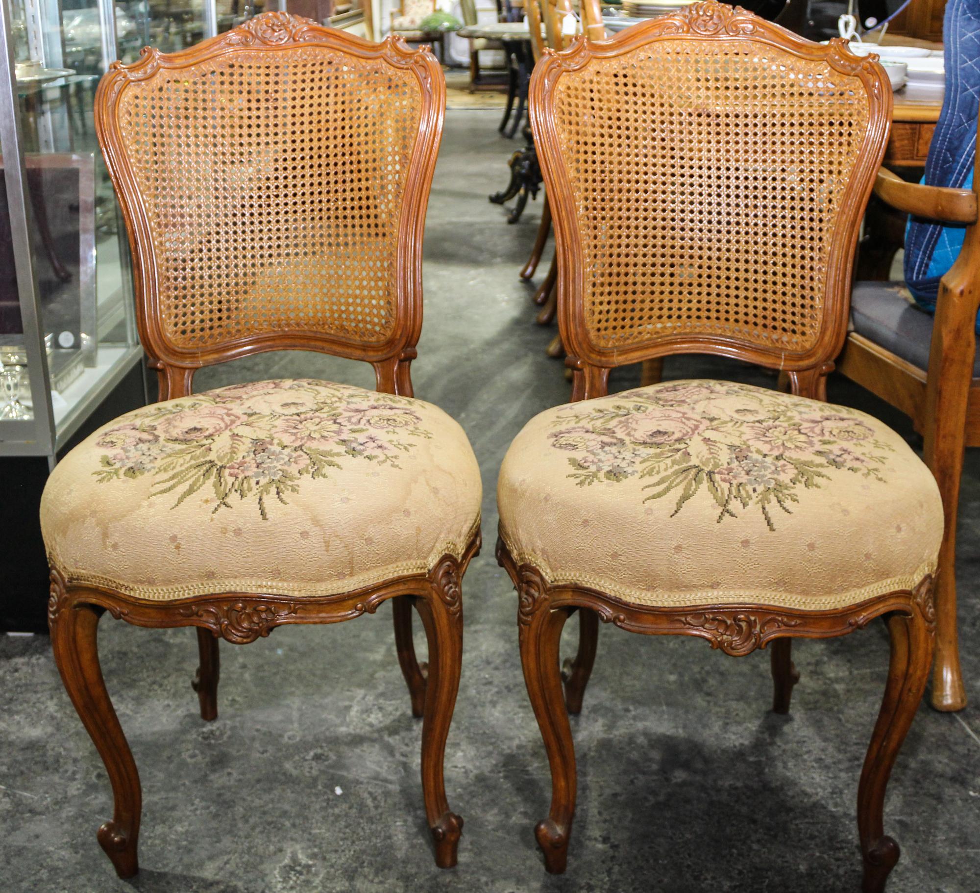 A Pair of Louis XV Style Chairs. Height of each 36 inches.