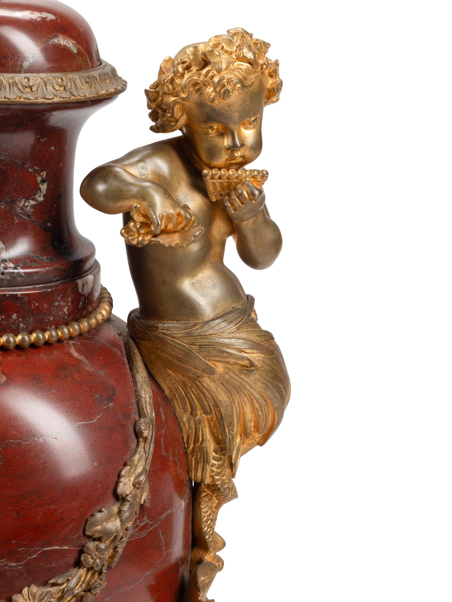 A Pair of Napoleon III Gilt Bronze Mounted Rouge Griotte Marble Urns