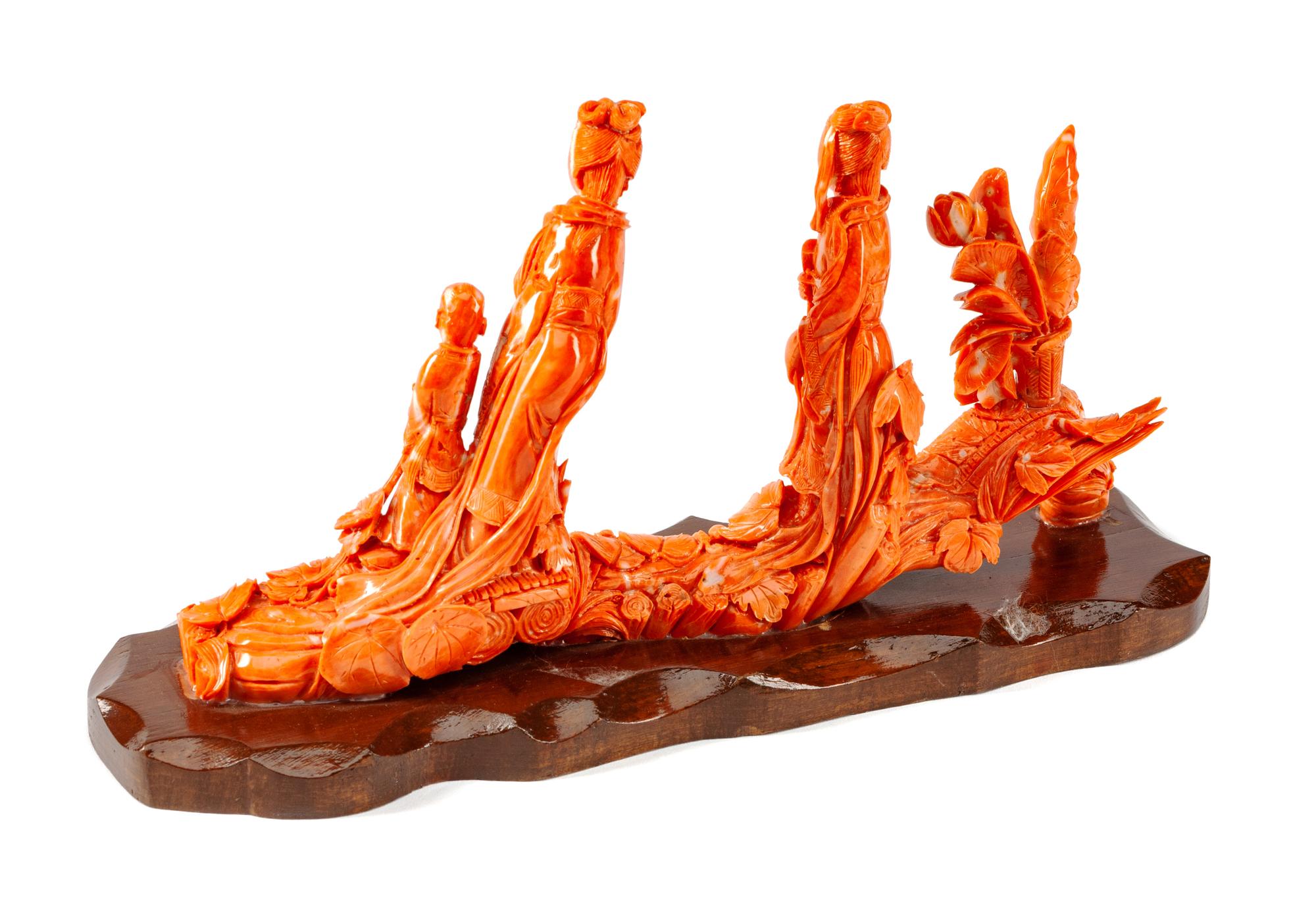 A Chinese Carved Coral Figural Group