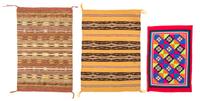 A Group of Nine Rugs Largest 14 x 9 inches.