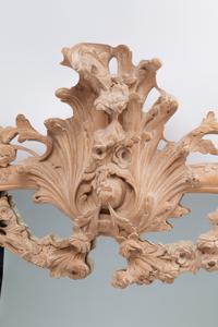 A German Rococo Style Limed Wood Overmantel Mirror