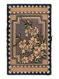 A Flower Decorated Hooked Rug