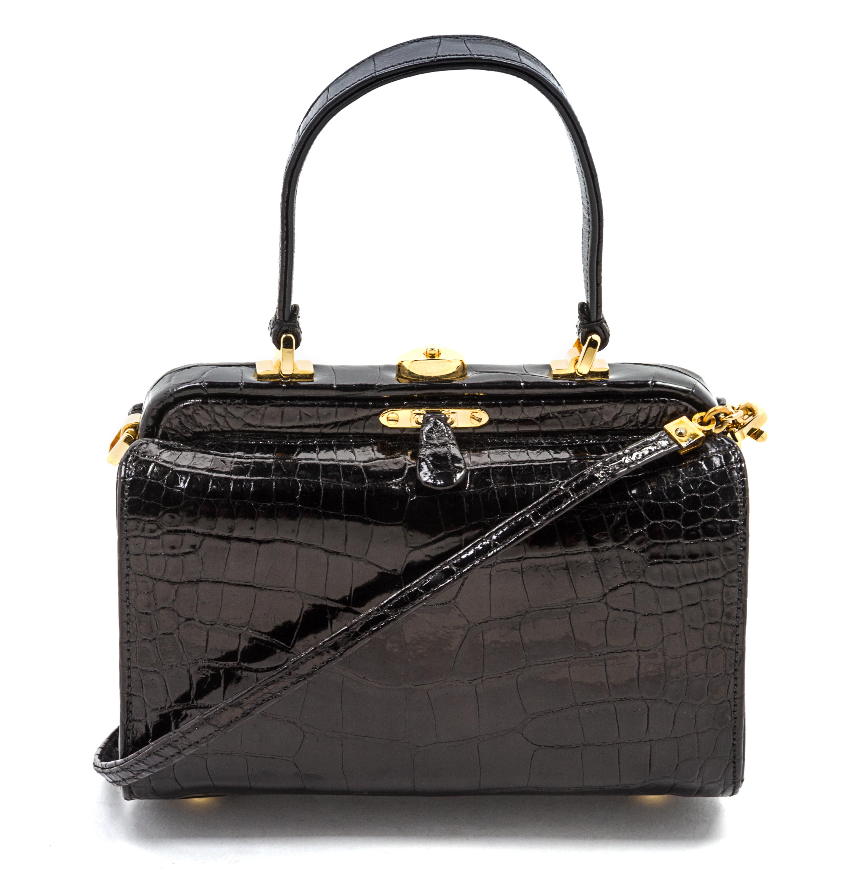 A Judith Leiber Black Alligator Mini Handbag, 5 1/2 x 3 1/2 x 2 inches.
