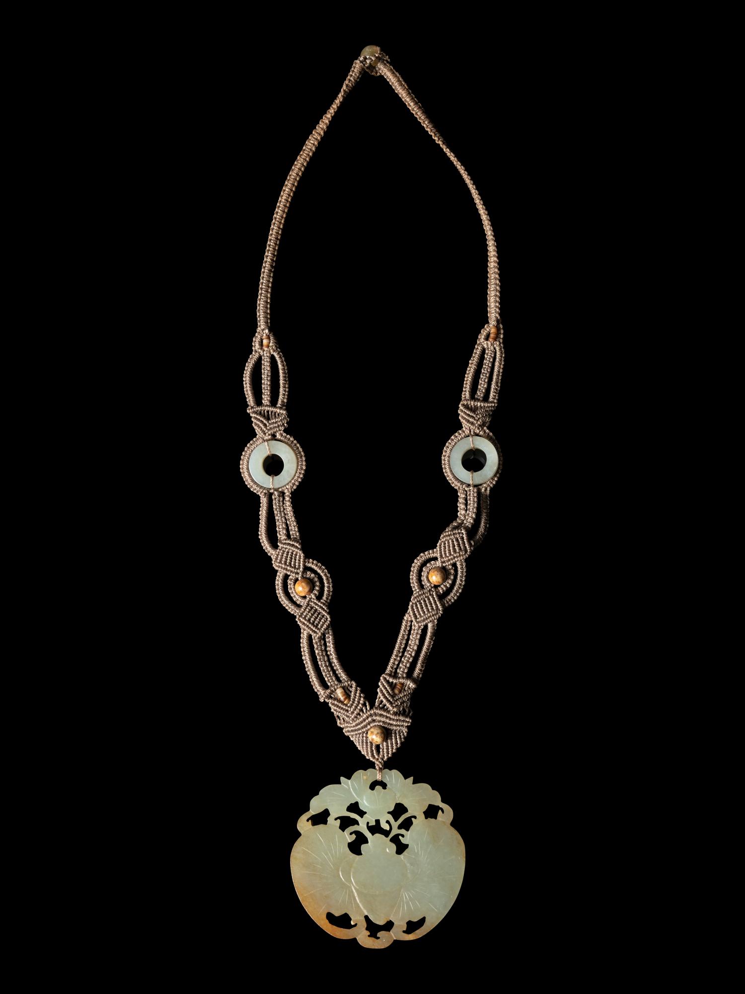 A Chinese Light Russet and Celadon Jade Pendant
