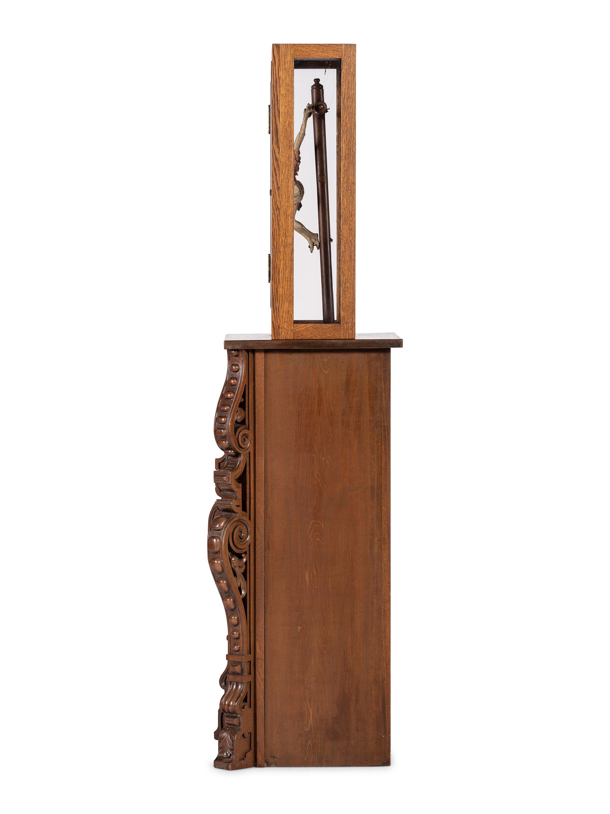 A Spanish Colonial Carved and Painted Wood Crucifix