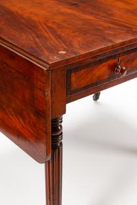 A Regency Style Mahogany Drop-Leaf Table