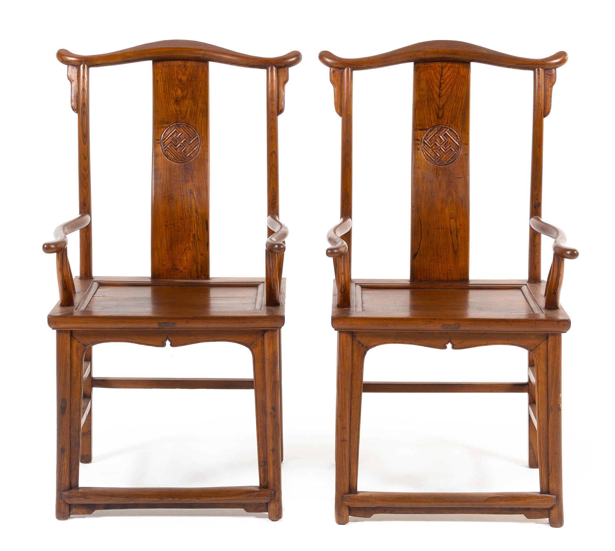A Pair of Chinese Elmwood Official's Hat Armchairs, Sichutouguanmaoyi Height 45 x width 22 x depth 17 1/8 inches. — QING DYNASTY (1644-1911)