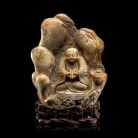 A Chinese Burnt Jade 'Luohan' Boulder 火燒玉羅漢山子