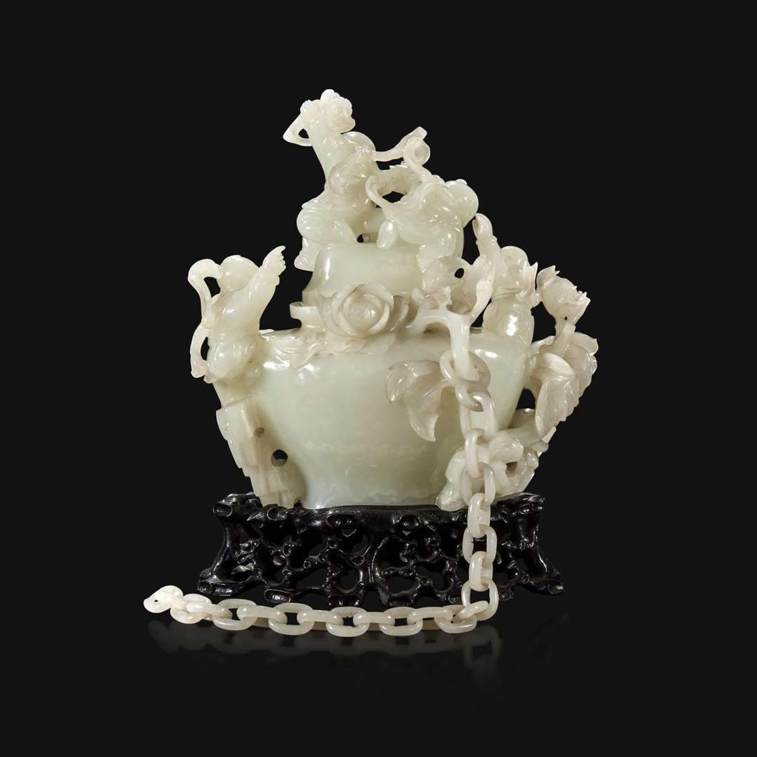 A Chinese carved white jade "Boys" vase and cover Qing Dynasty, 18th/early 19th Century