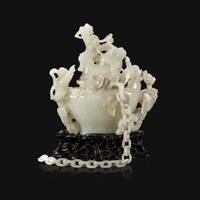 A Chinese carved white jade "Boys" vase and cover Qing Dynasty, 18th/early 19th Century