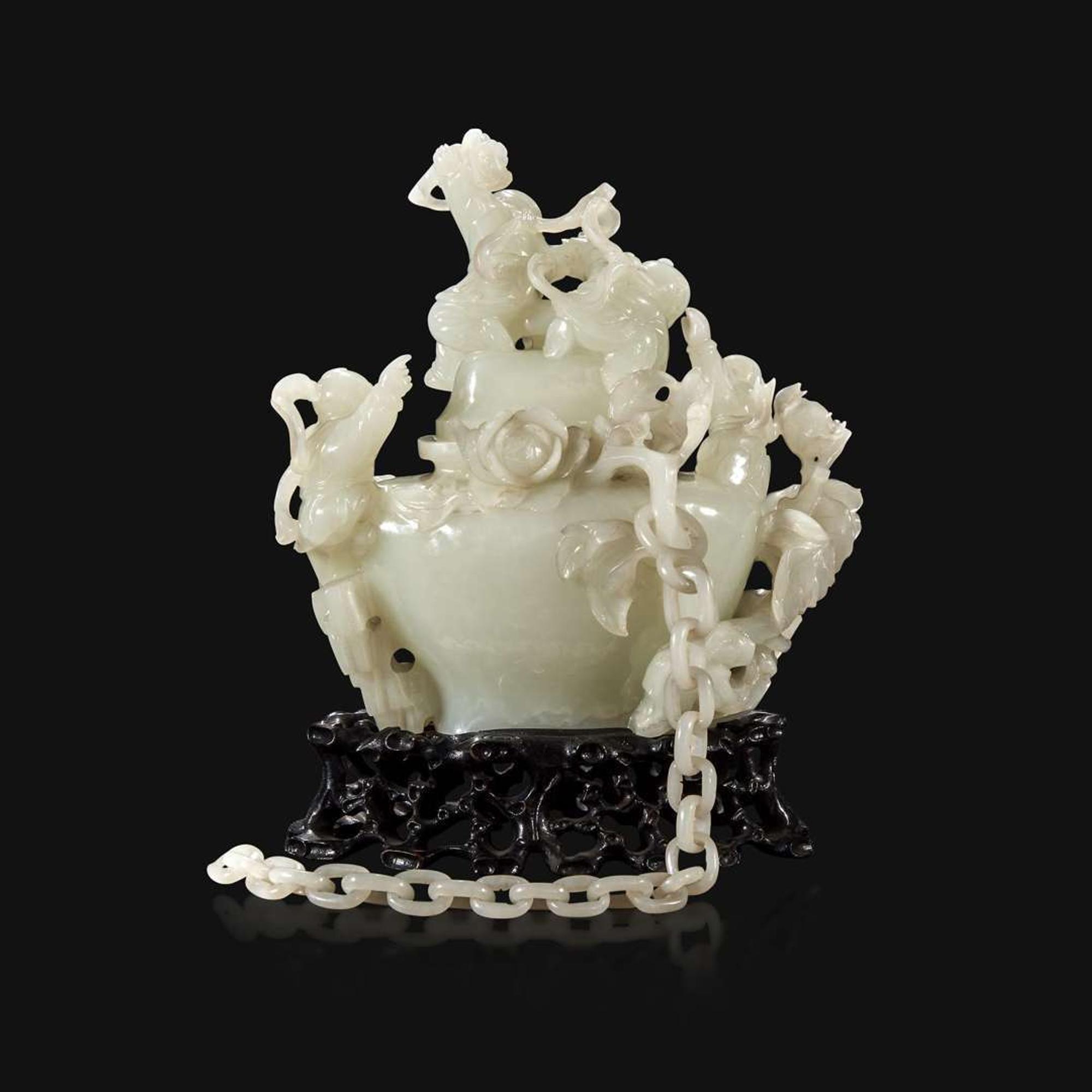 A Chinese carved white jade "Boys" vase and cover Qing Dynasty, 18th/early 19th Century