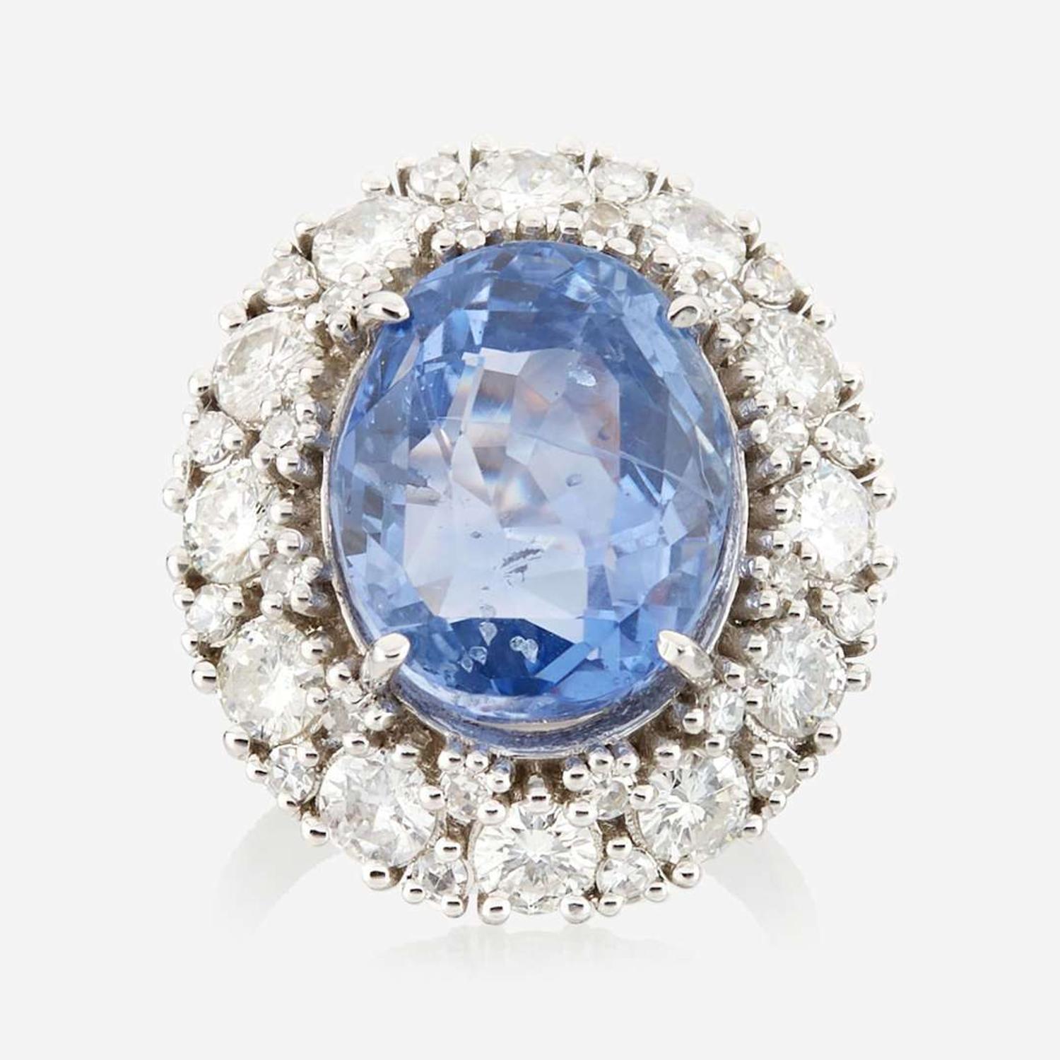 A sapphire, diamond, and white gold ring