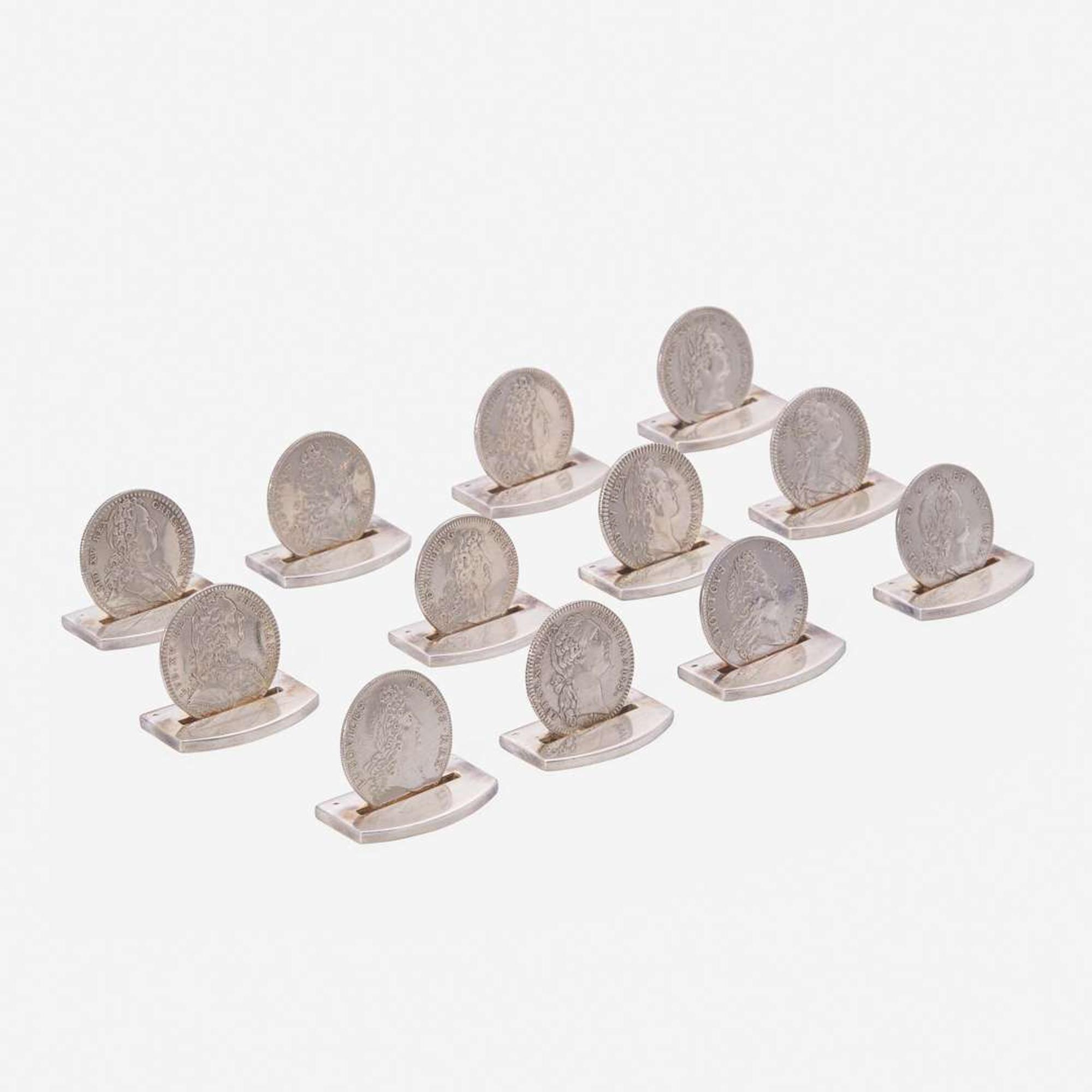 A Cased Set of Twelve French Silver Place Card Holders Ravinet Louis & Denfert Charles, retailed by Hermès, Paris, mid 20th century