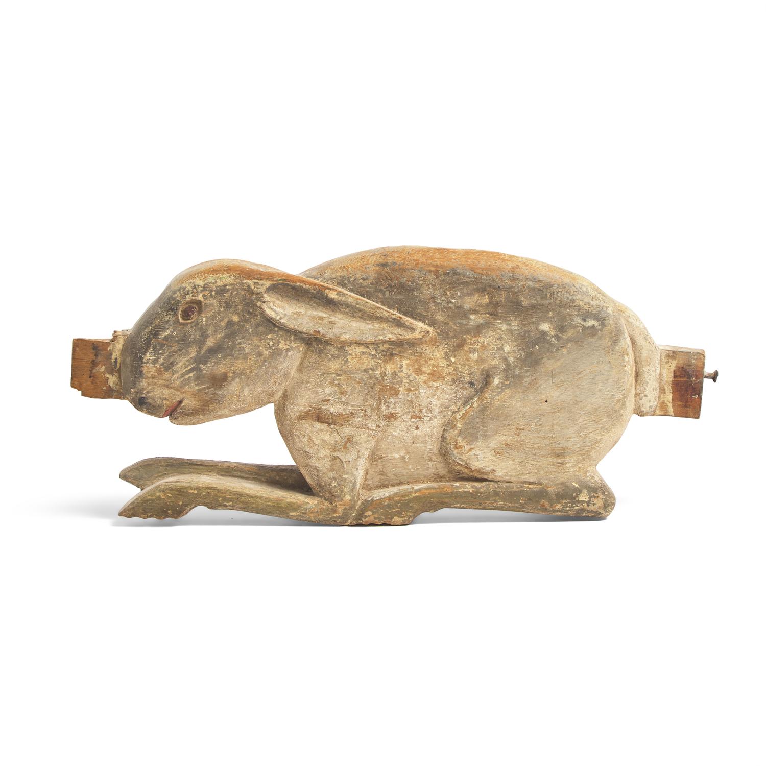 A Carved and Painted Figure of a Rabbit