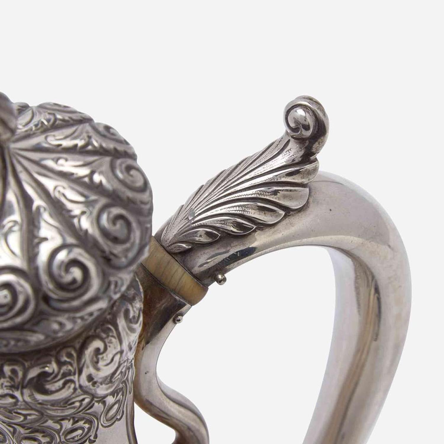 A sterling silver repoussé after-dinner coffeepot Durgin, Concord, NH, late 19th century