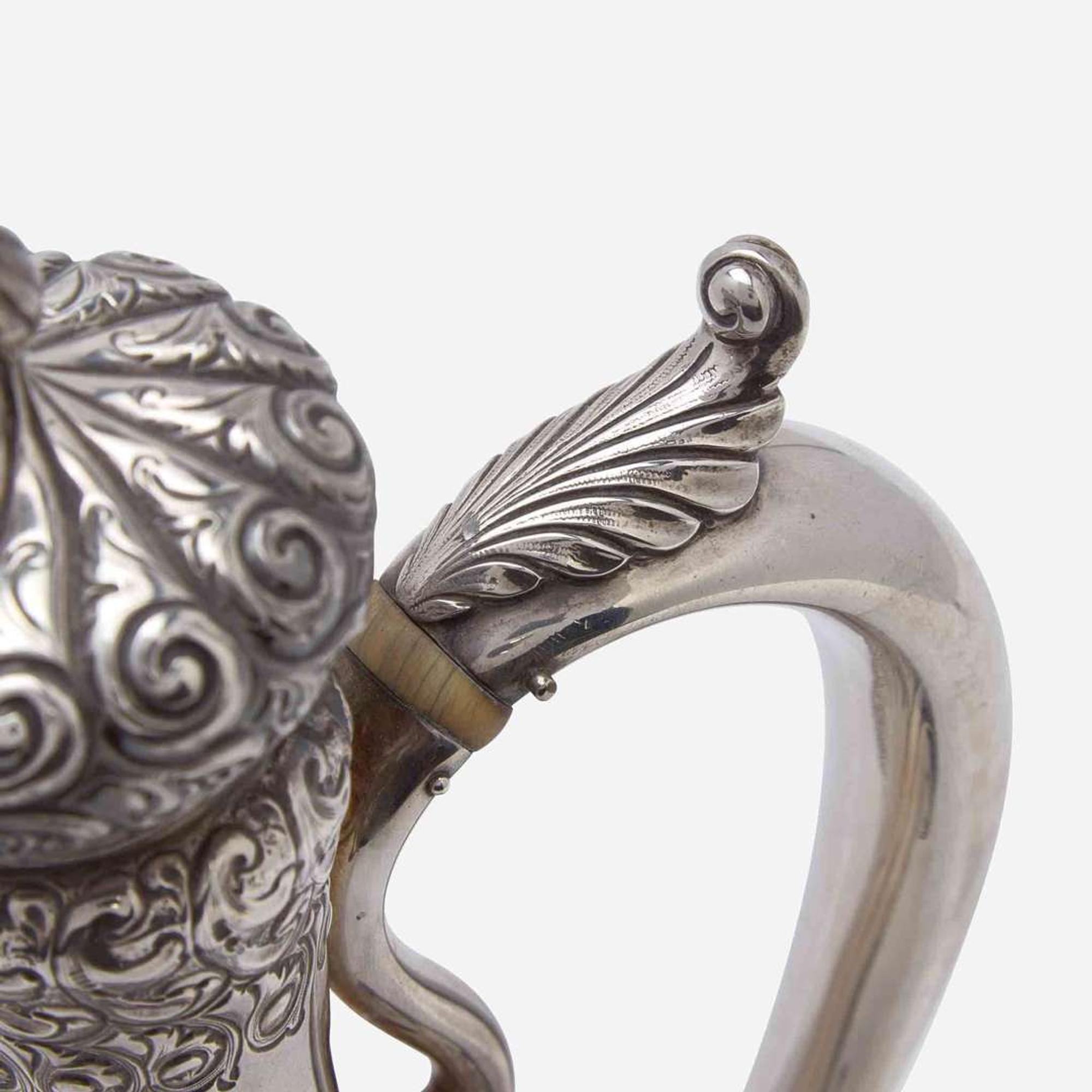 A sterling silver repoussé after-dinner coffeepot Durgin, Concord, NH, late 19th century