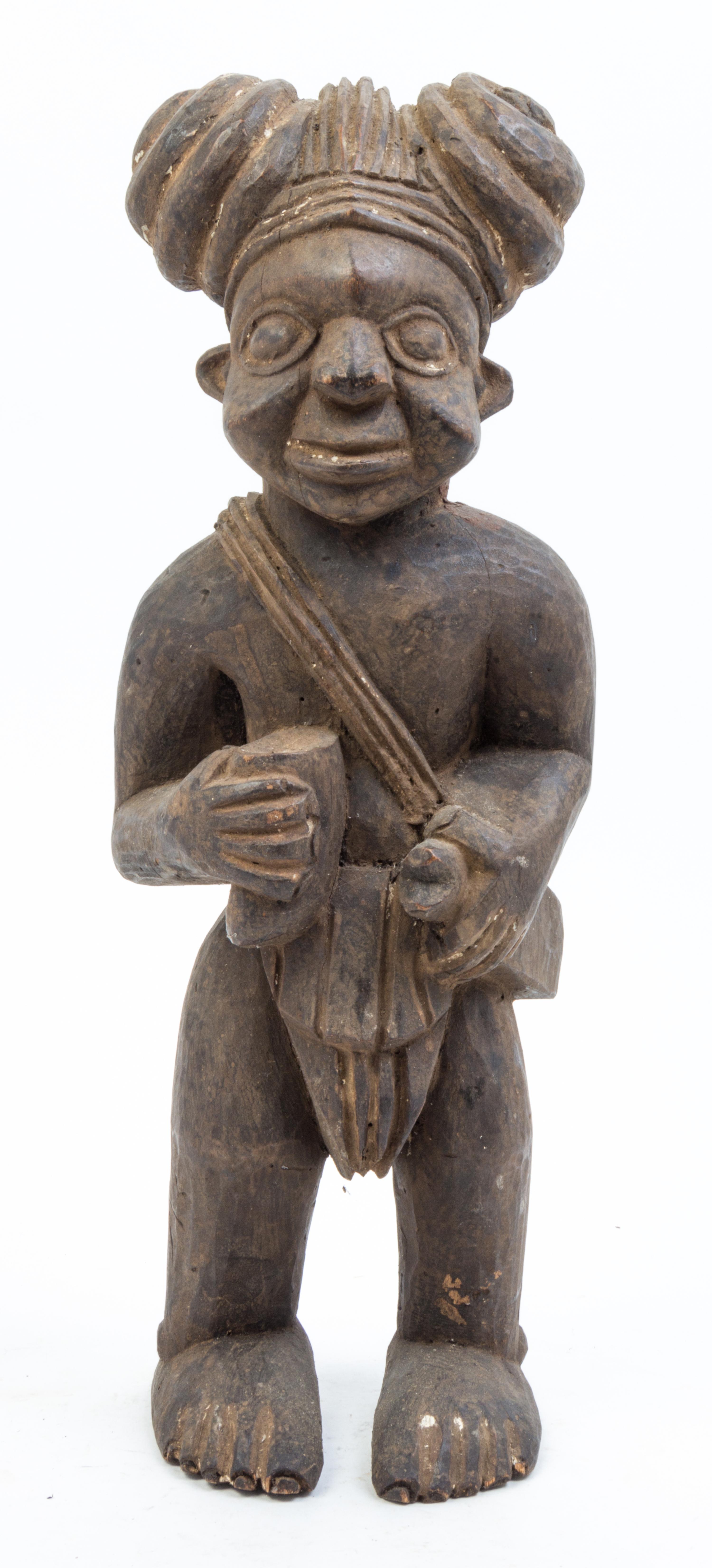 An African Wood Figure Height 16 1/2 inches.