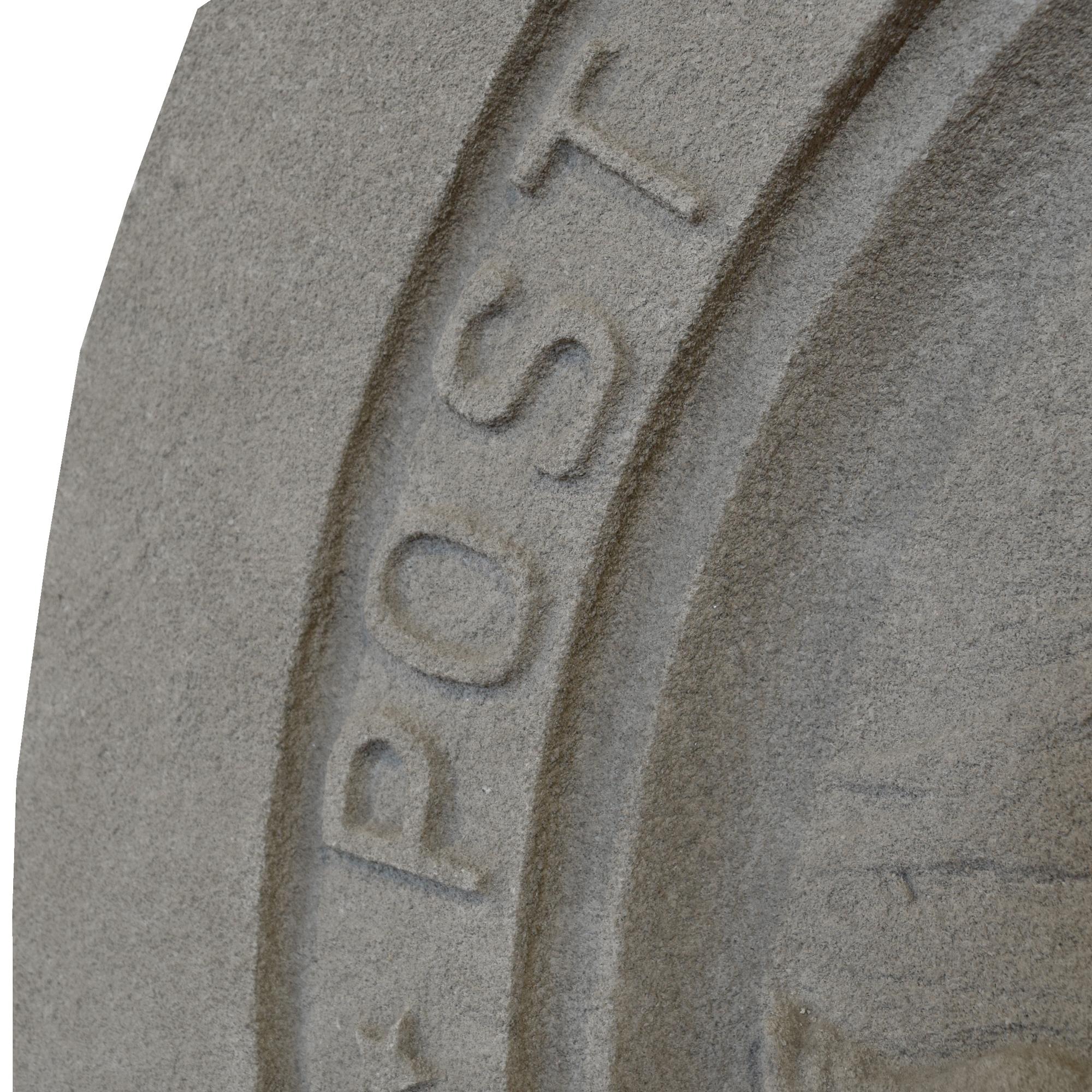 A Carved Limestone Roundel from a Chicago, IL. Post Office Building 37" W x 6" D x 39.5" H — United States, 20th Century