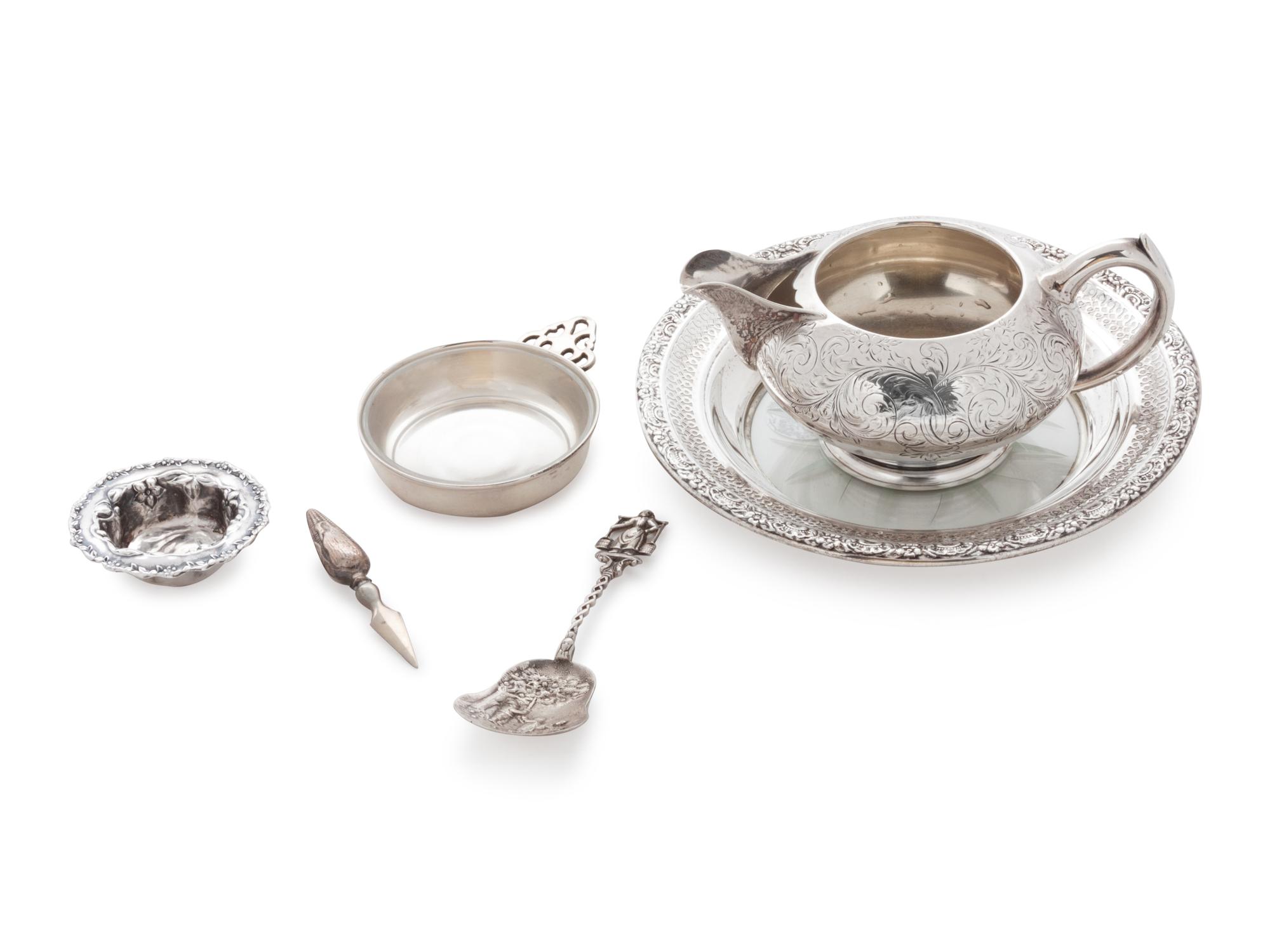 comprising: a creamer, a decorative spoon, a small bowl, a wine coaster with glass bottom, five corn holders, and six salts with glass liners, 15 items total.